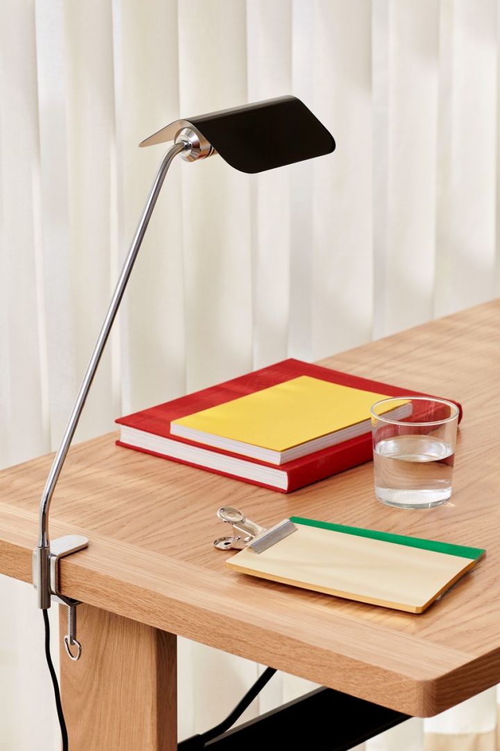 The Apex table lamp from HAY clips on the side of any desk allowing you to include adjustable task lighting in any home office. 